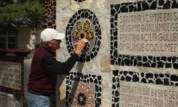 Emekli işçi, dağlardan topladığı volkanik taşlarla evinin bahçesine sanat duvarı yaptı